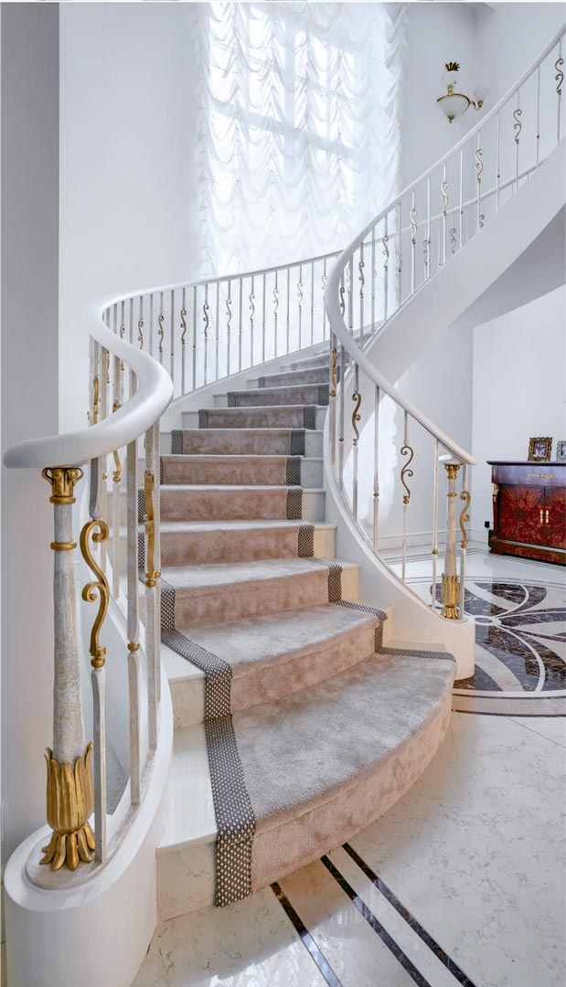 Steel constructions stairs, marble, forged metal, details coates with gold, wood armrest.